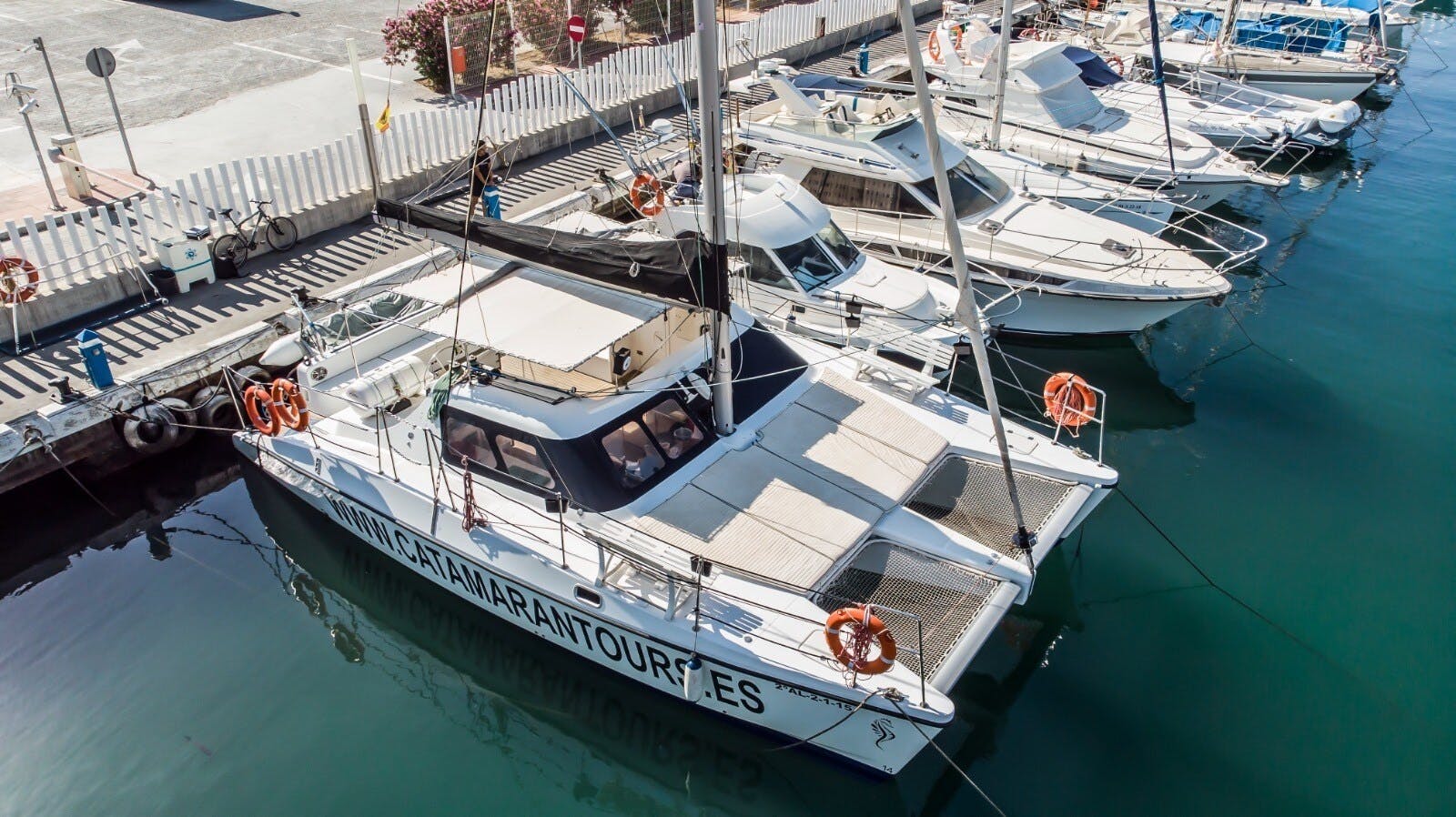 Sunset catamaran cruise from Caleta Velez