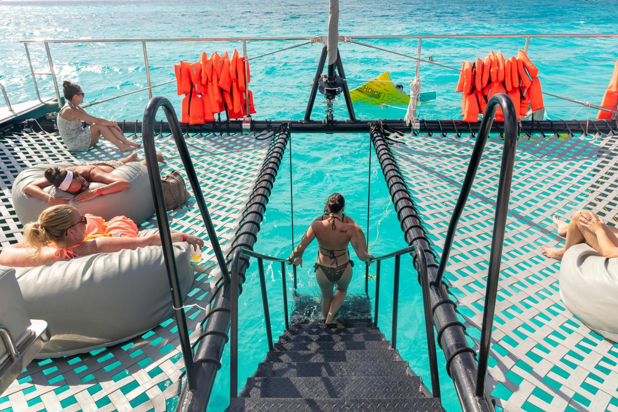 Catamaran cruise to Isla Mujeres with beach club visit and brunch