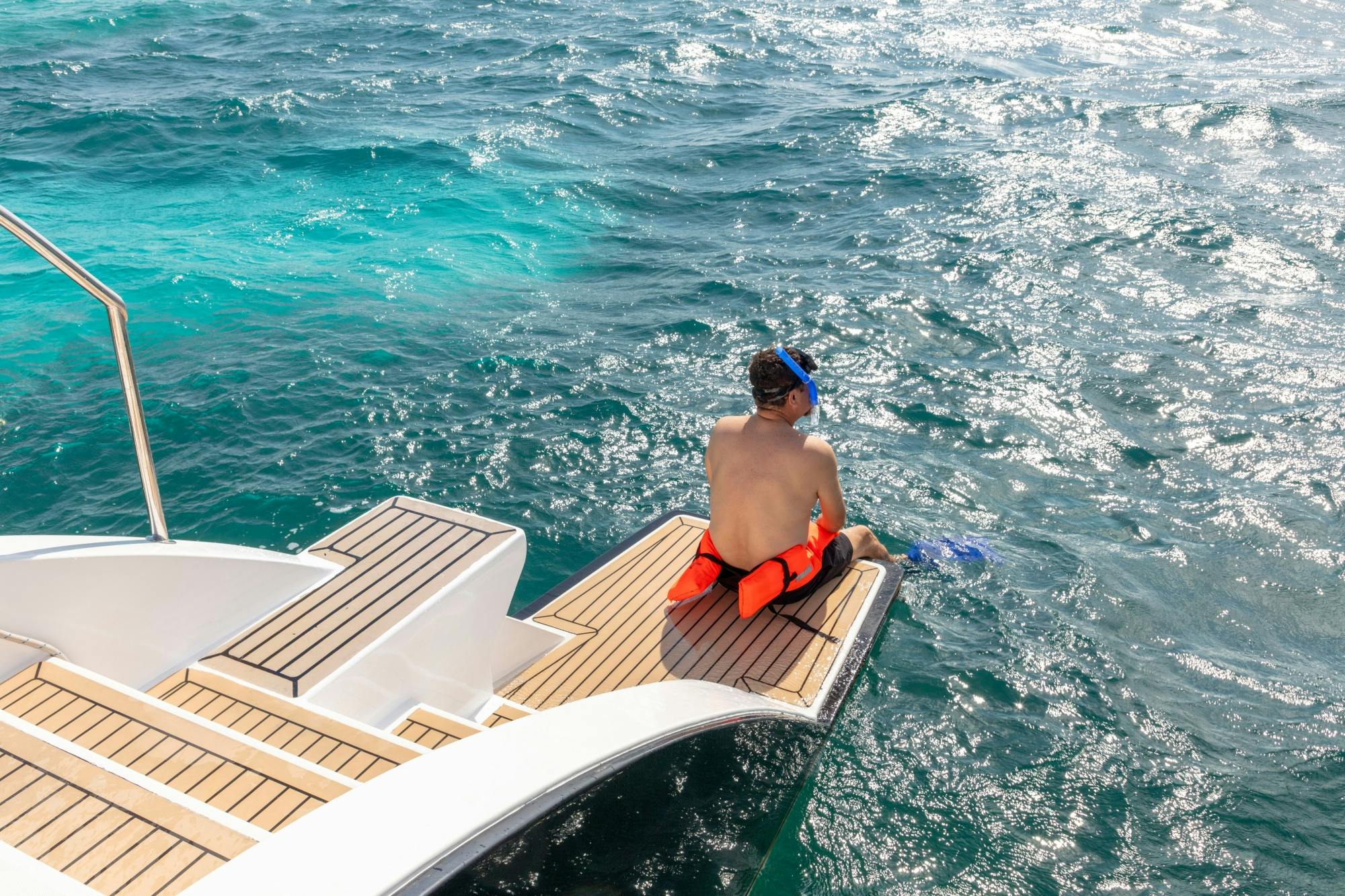 Catamaran cruise to Isla Mujeres with beach club visit and brunch
