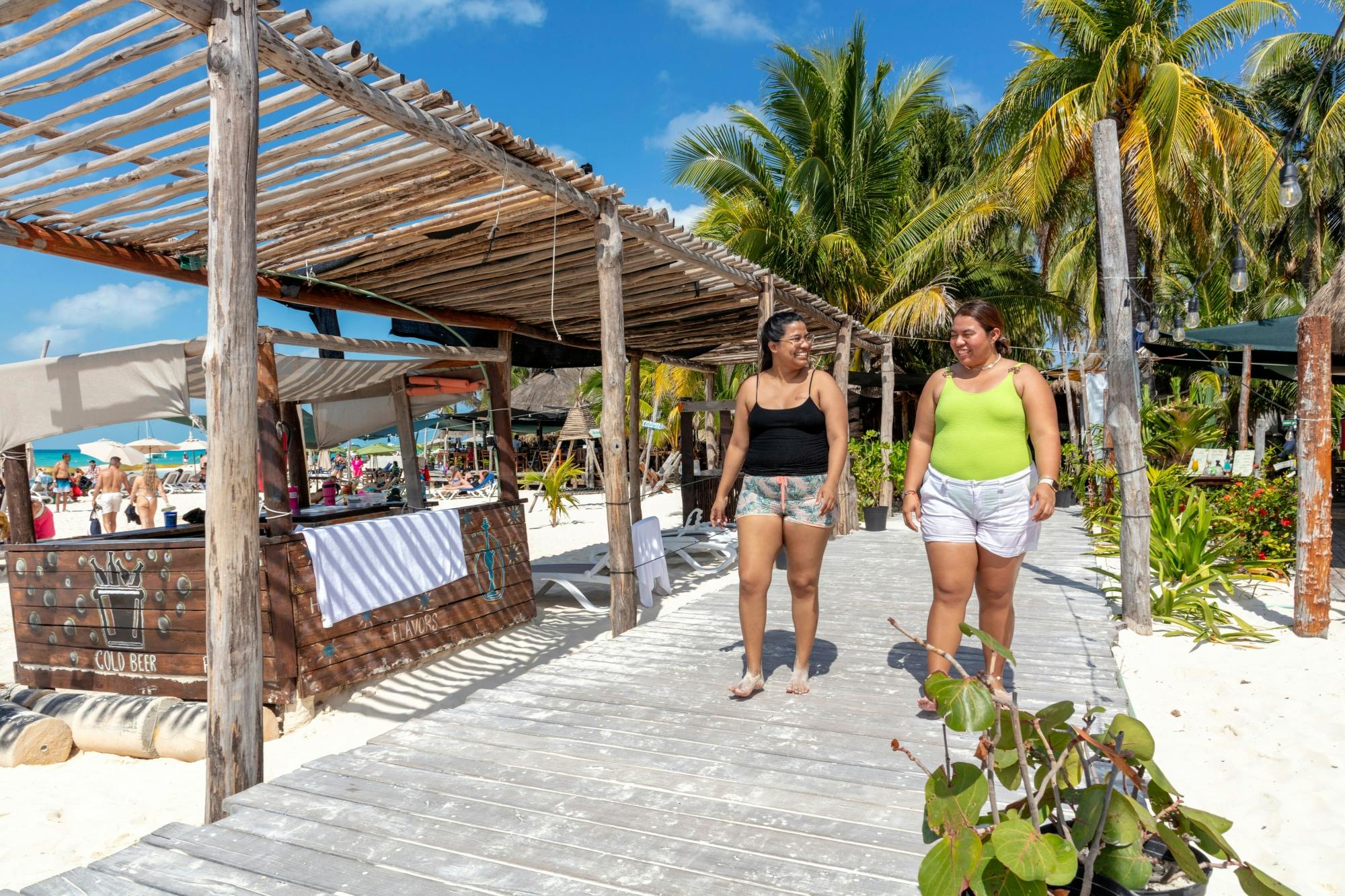 Catamaran cruise to Isla Mujeres with beach club visit and brunch