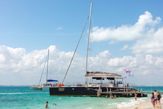 Catamaran cruise to Isla Mujeres with beach club visit and brunch