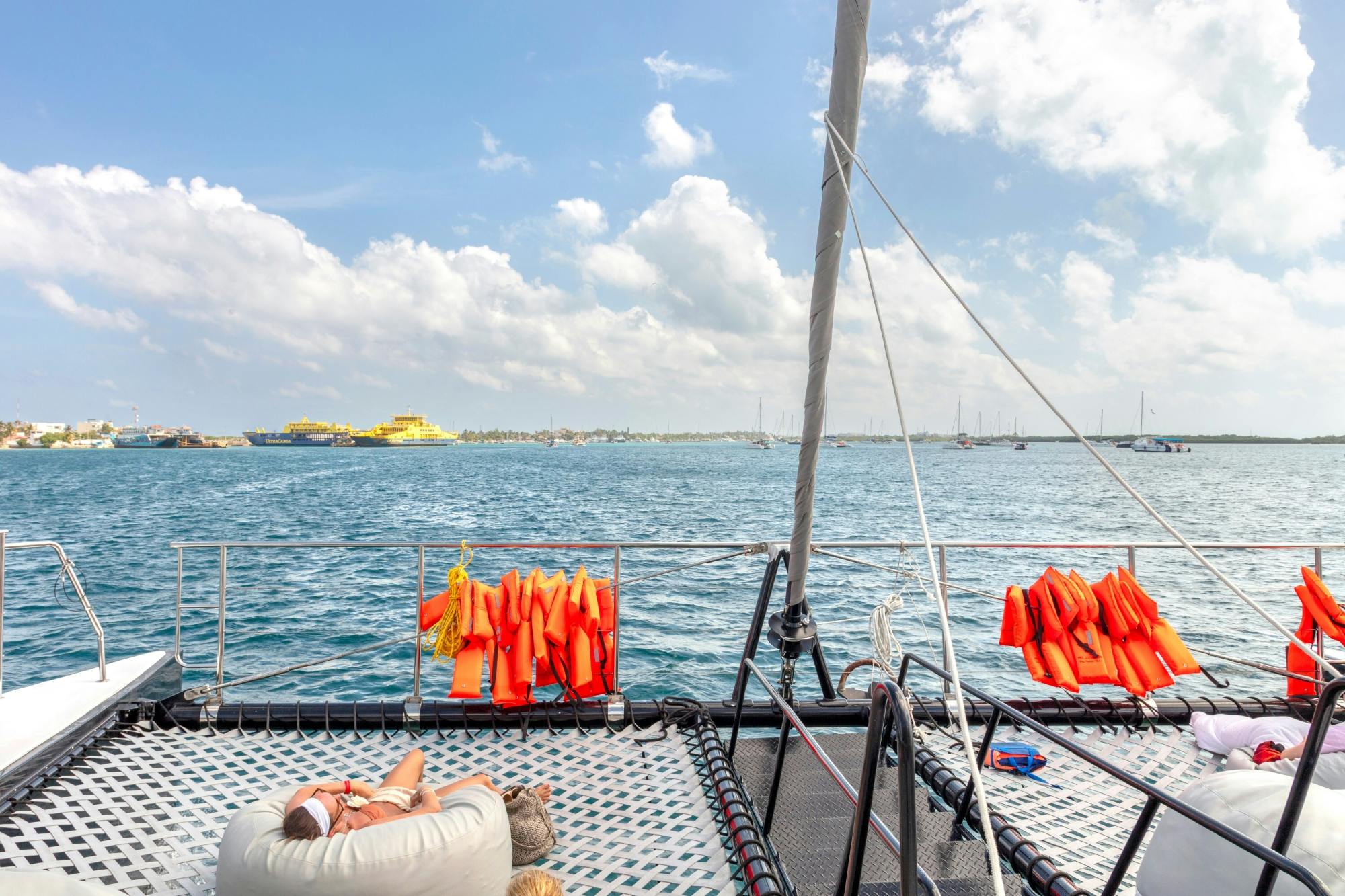 Catamaran cruise to Isla Mujeres with beach club visit and brunch