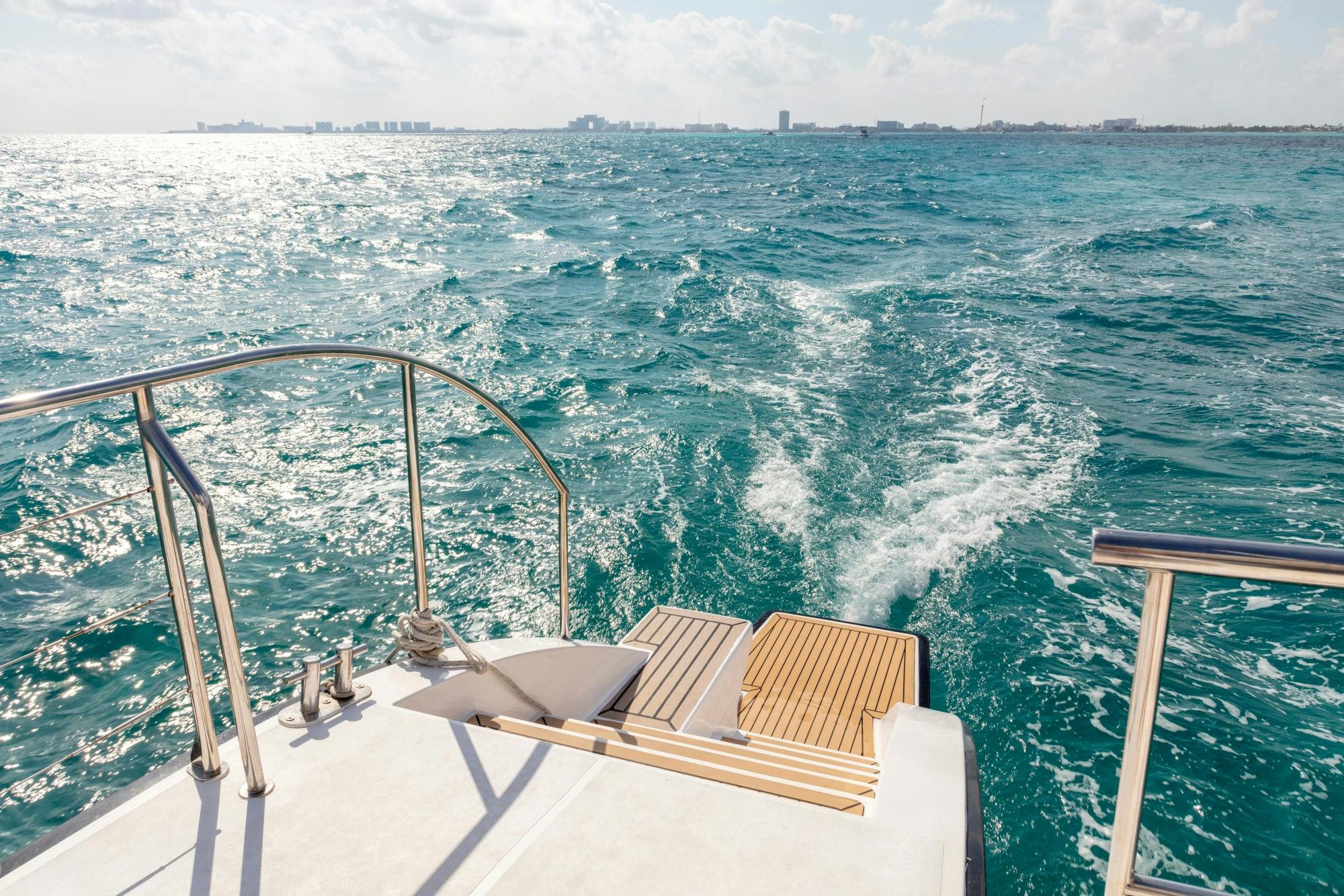 Catamaran cruise to Isla Mujeres with beach club visit and brunch