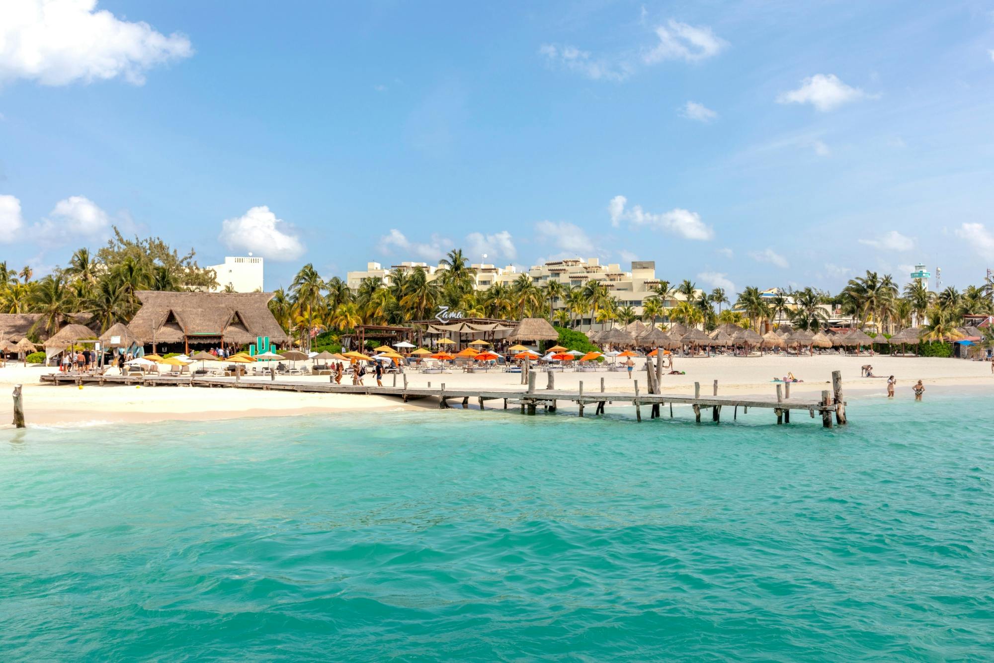Catamaran cruise to Isla Mujeres with beach club visit and brunch