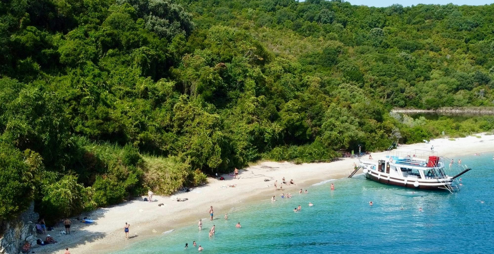 Corfu Blue Caves cruise with swim stops, lunch and optional transfers