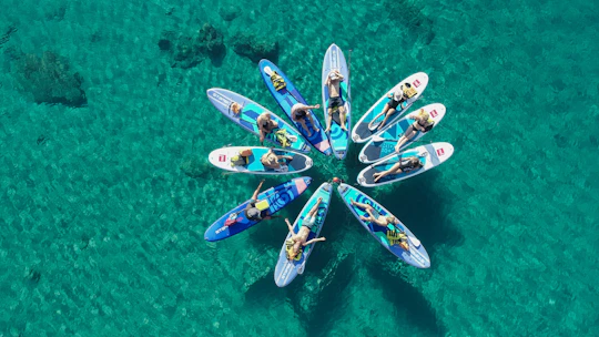 Small-group coastal SUP experience with sea caves and snorkelling