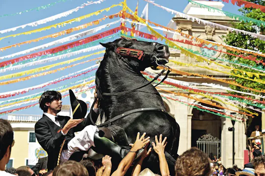 Festeggiamenti in onore della Mare de Déu de Gràcia e gita in barca nel porto di Mahón