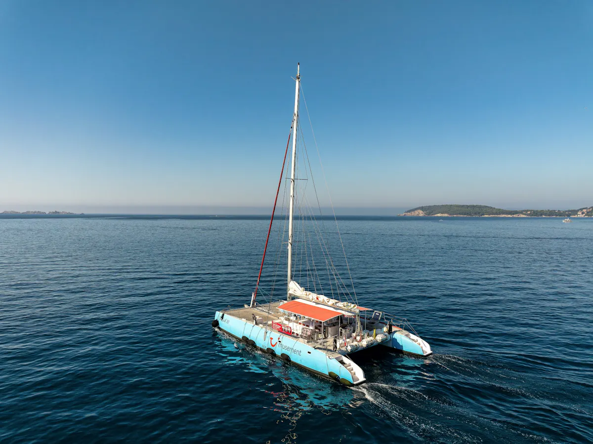 Adults-only Corfu sunset catamaran cruise with drinks, dinner and optional transfers