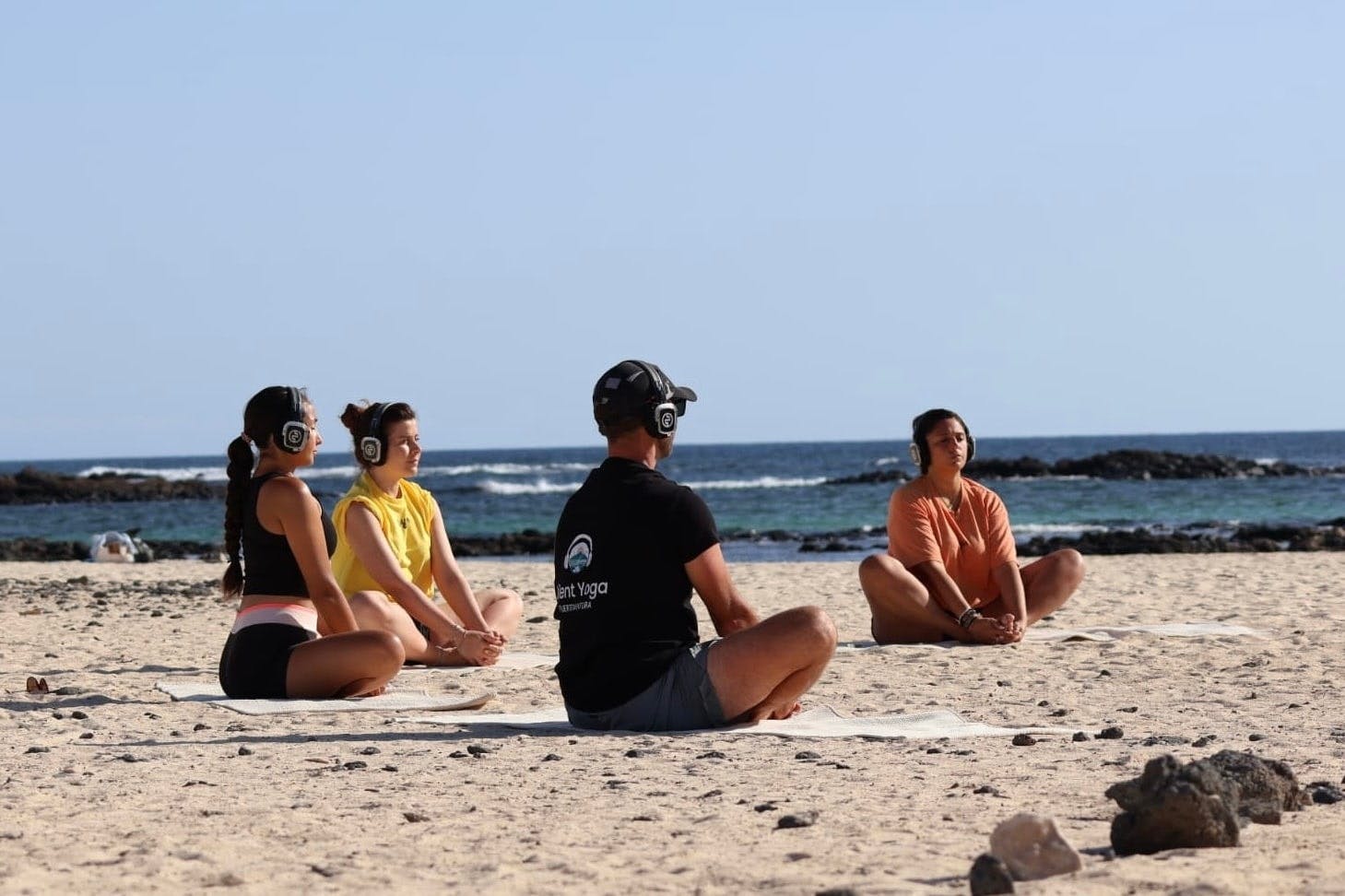 Sunset yoga experience in El Cotillo