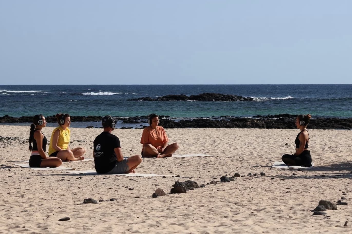 Sunset yoga experience in El Cotillo