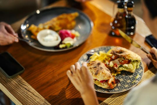 Recorrido gastronómico por el centro de Orlando con 5 degustaciones y bocaditos de cerdo glaseados