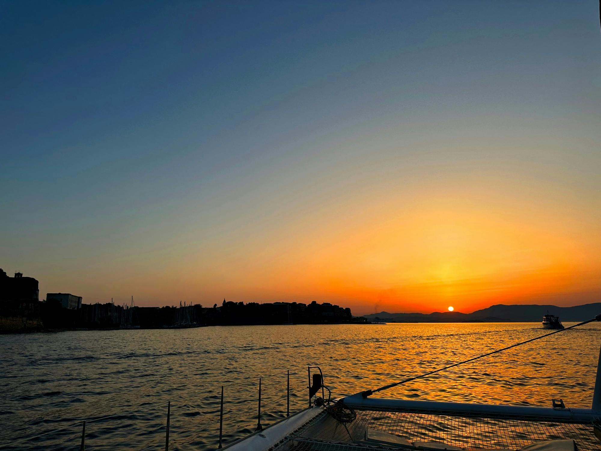 Adults-only Corfu sunset catamaran cruise with drinks, dinner and optional transfers