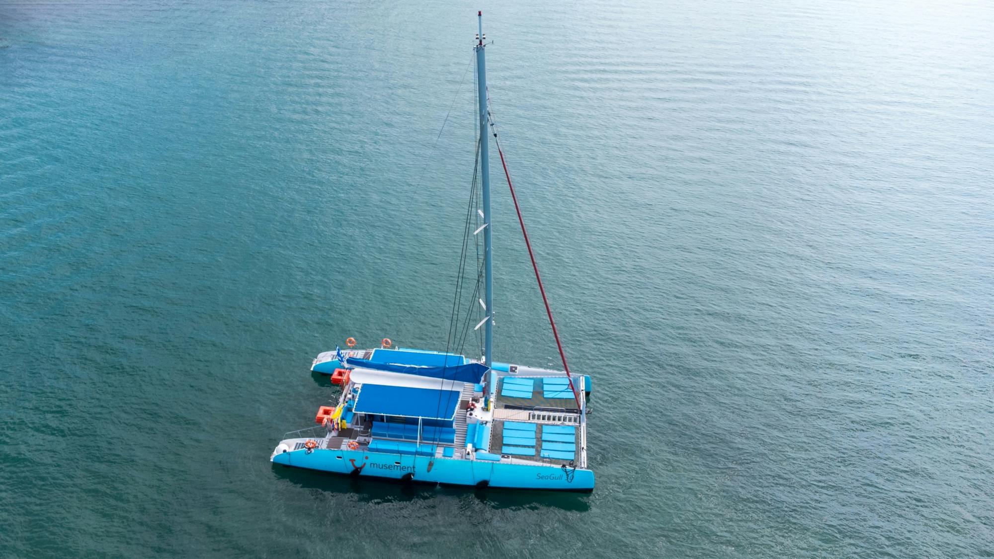 Corfu catamaran cruise with Greek lunch, drinks and optional transfers