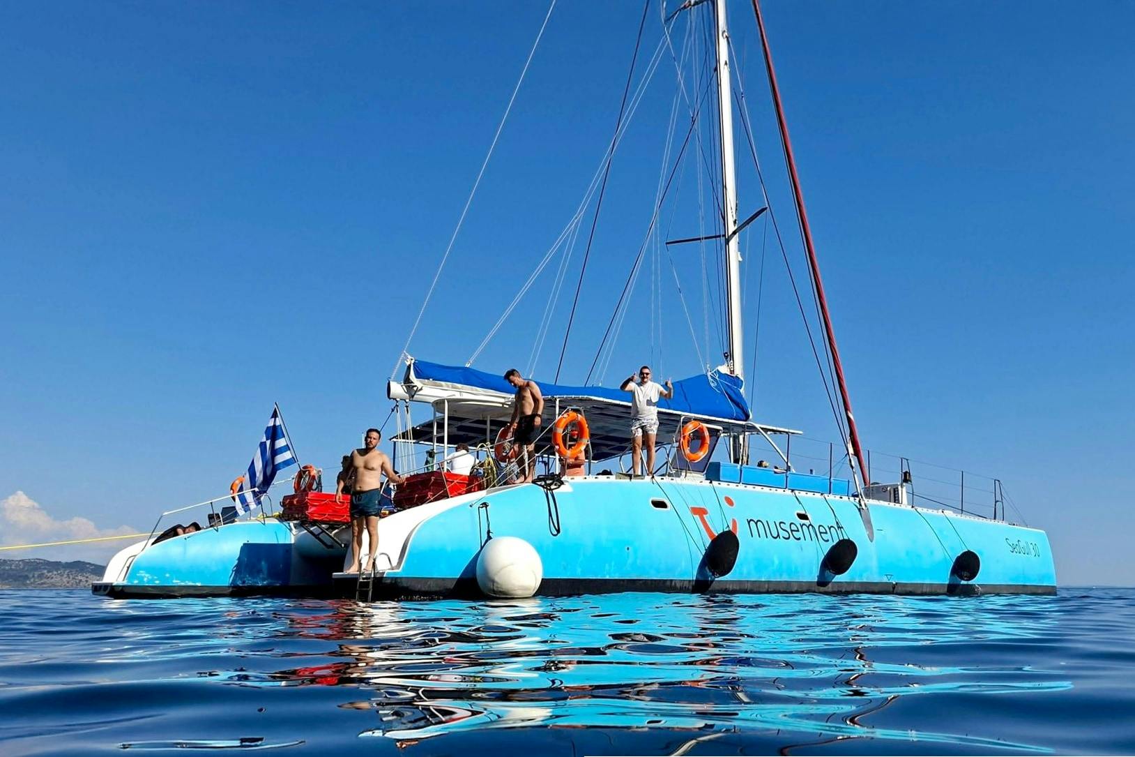 Corfu east coast catamaran cruise with drinks, meal and optional transfers