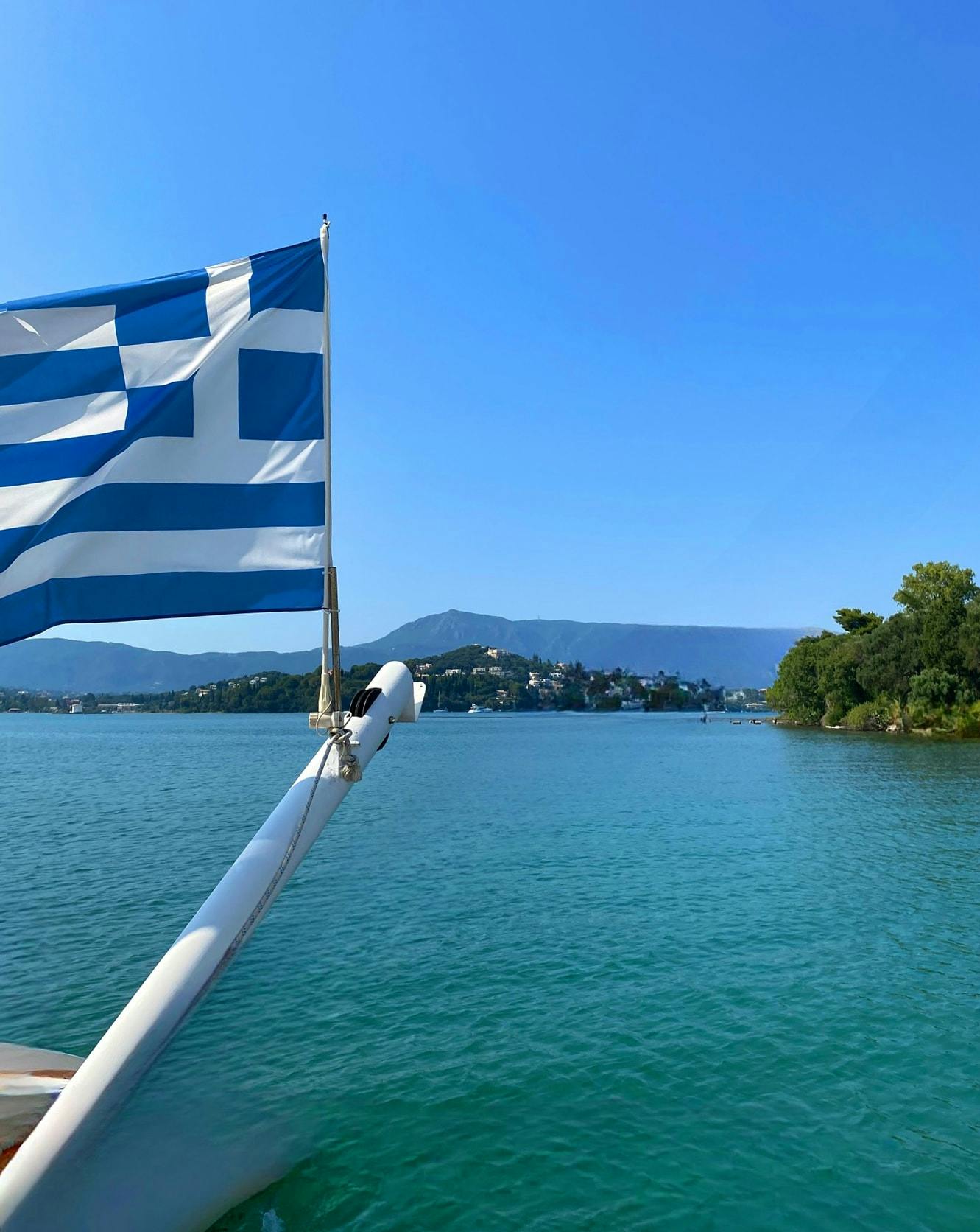 Corfu east coast catamaran cruise with drinks, meal and optional transfers