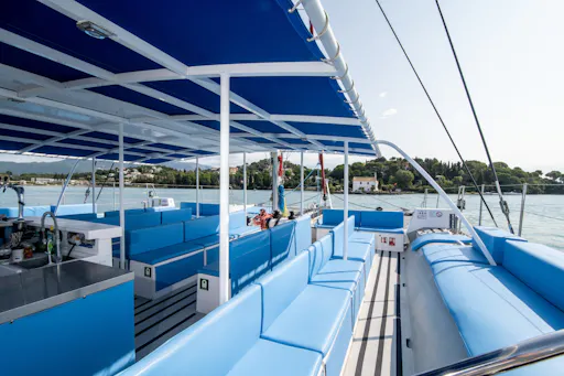 Corfu catamaran cruise with Greek lunch, drinks and optional transfers