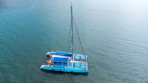 Adults-only Corfu sunset catamaran cruise with drinks, dinner and optional transfers