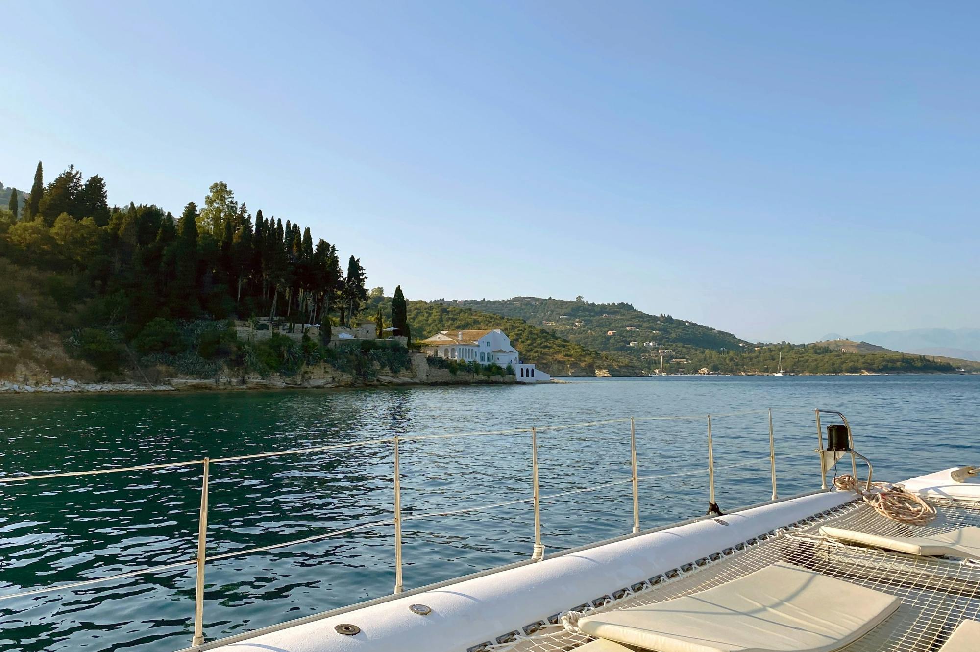 Corfu east coast catamaran cruise with drinks, meal and optional transfers