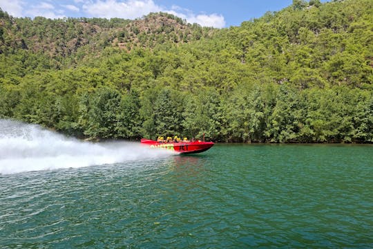 Monster buggy and truck, jet boat and zipline tour with boat cruise and lunch