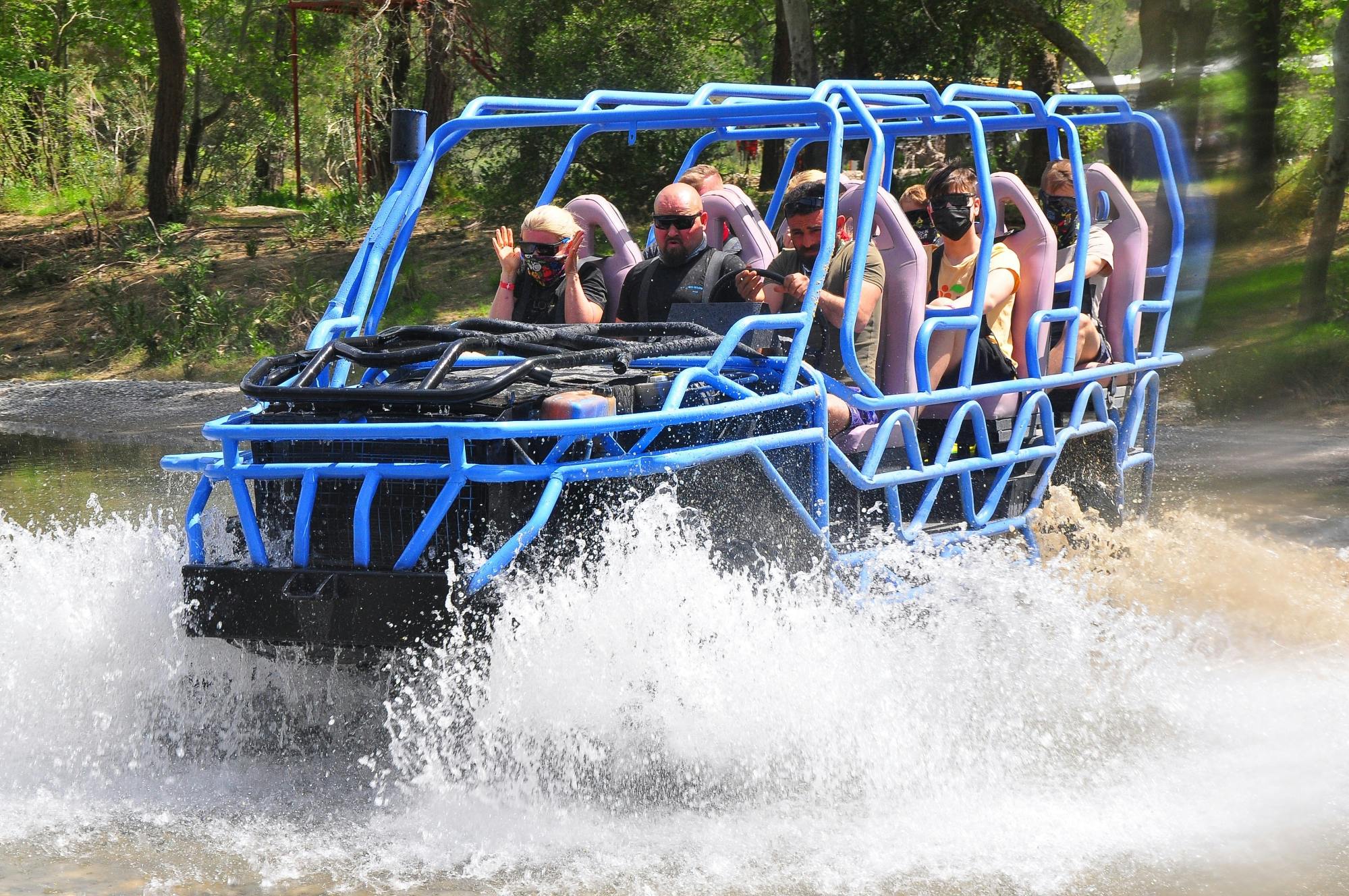 Monster buggy and truck, jet boat and zip-line tour with boat cruise and lunch