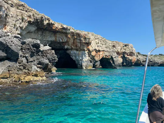 Boottocht bij zonsondergang naar de grotten van de Ionische kust en Leuca