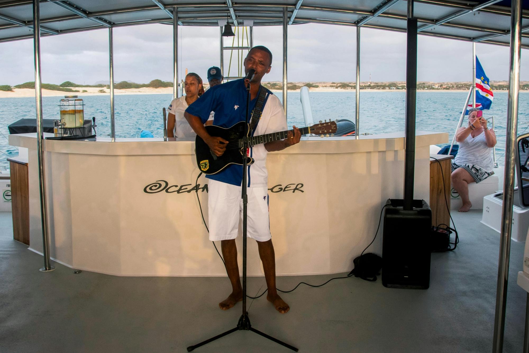 Sunset catamaran cruise with live music and open bar
