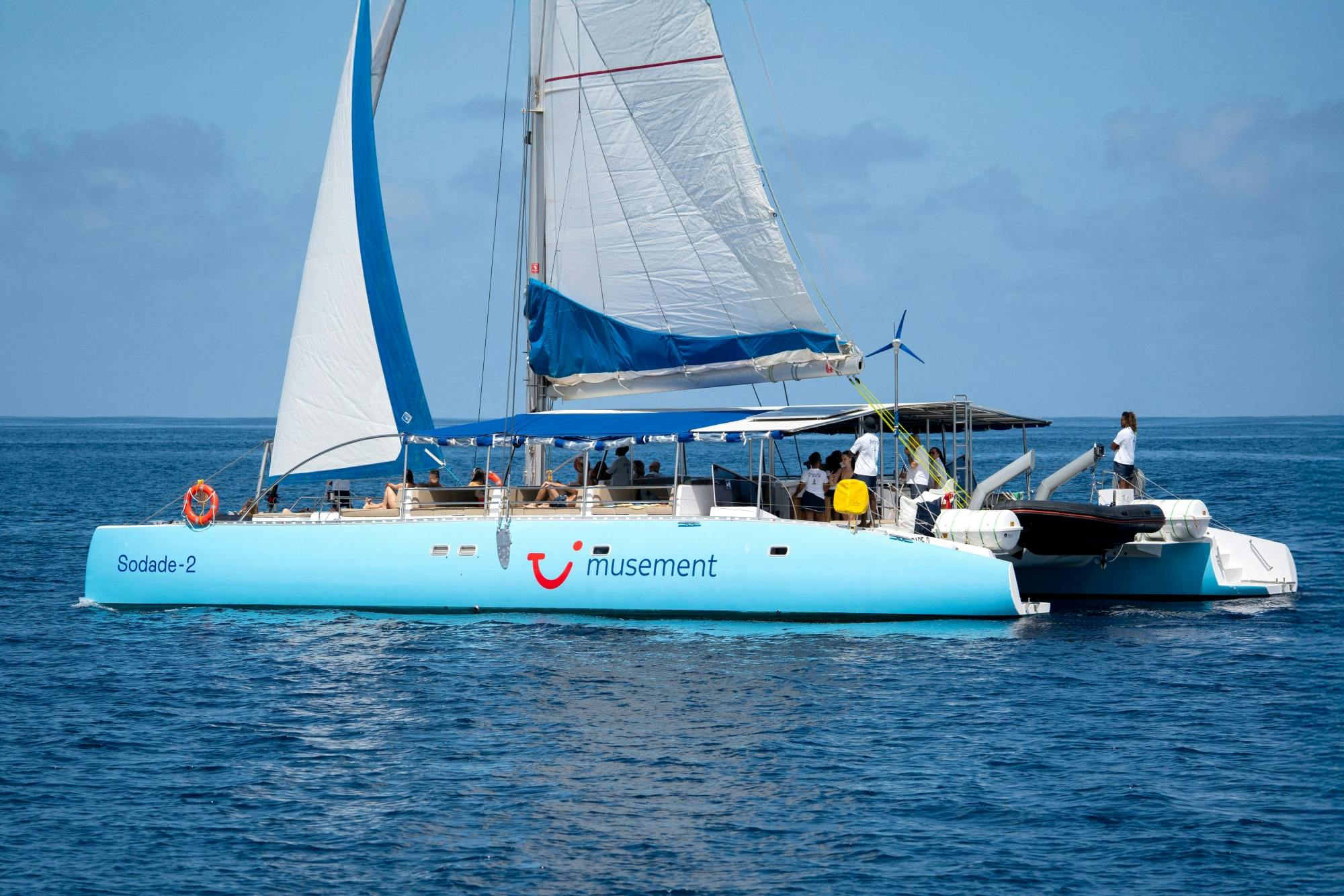 Sunset catamaran cruise with live music and open bar
