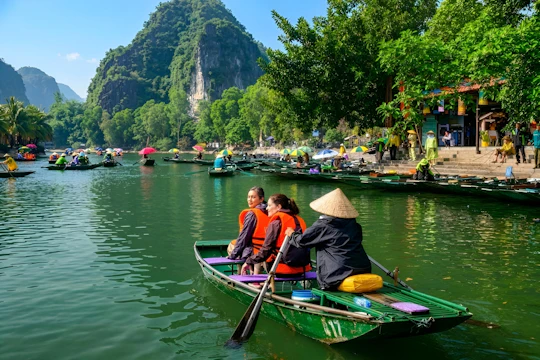 Ninh Bình afternoon tour from Hanoi with lantern boat and dinner