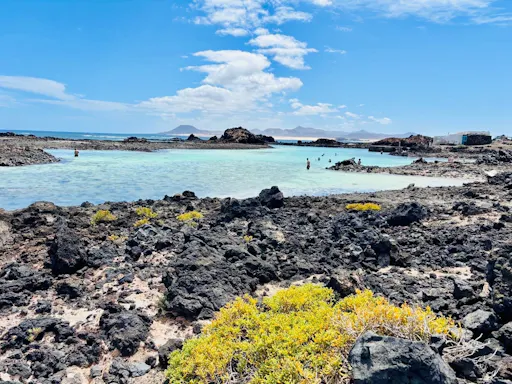 Small group guided tour of Lobos Island by fast ferry, Popcorn Beach and Corralejo Dunes