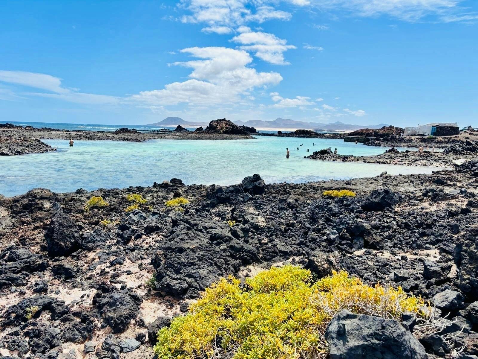 Small group guided tour of Lobos Island by fast ferry, Popcorn Beach and Corralejo Dunes
