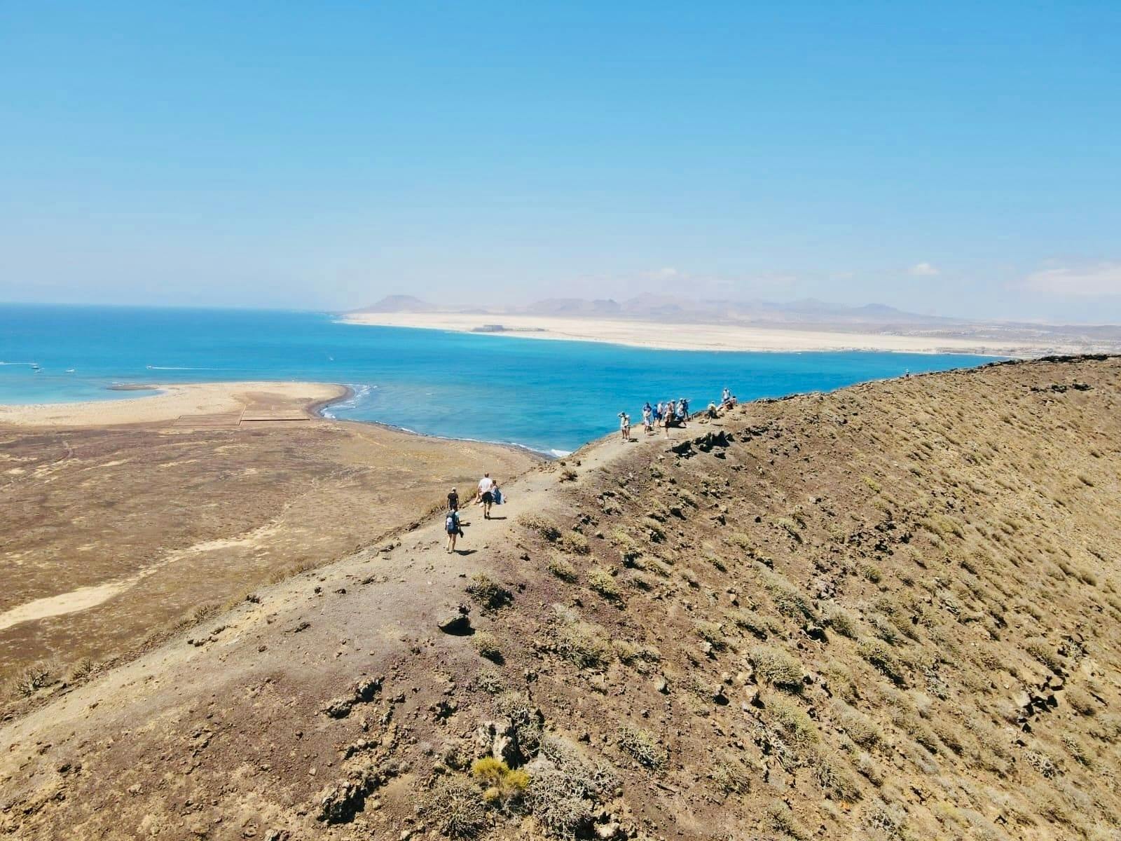 Small group guided tour of Lobos Island by fast ferry, Popcorn Beach and Corralejo Dunes