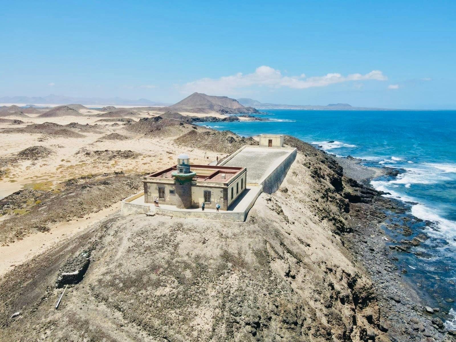 Small group guided tour of Lobos Island by fast ferry, Popcorn Beach and Corralejo Dunes