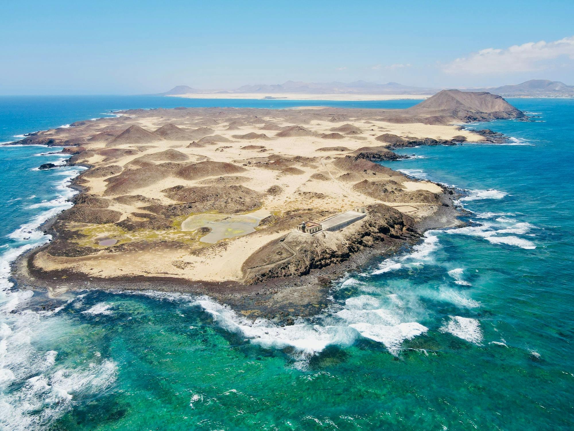 Small group guided tour of Lobos Island by fast ferry, Popcorn Beach and Corralejo Dunes