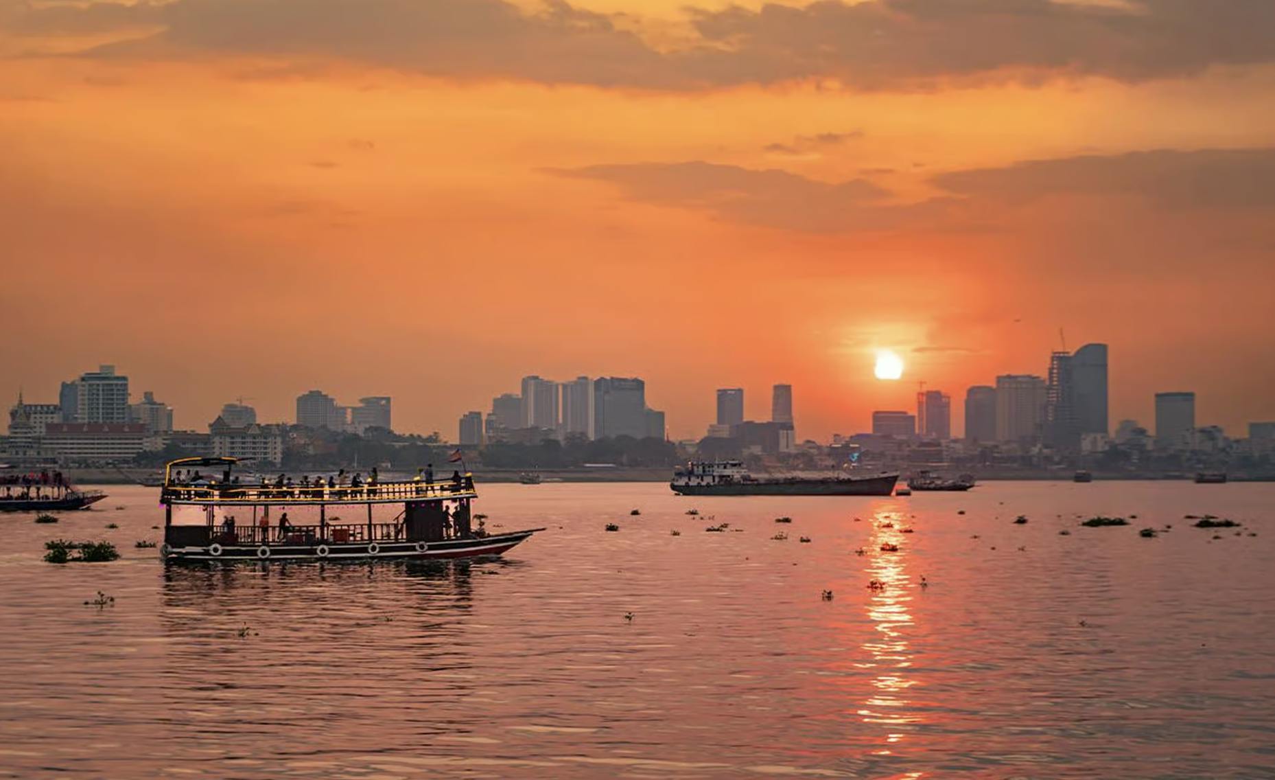 Silk Island sunset cruise Vespa tour in Phnom Penh