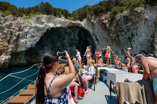 Boat trip from Corfu to Sivota with local lunch, Blue Lagoon and optional transfers