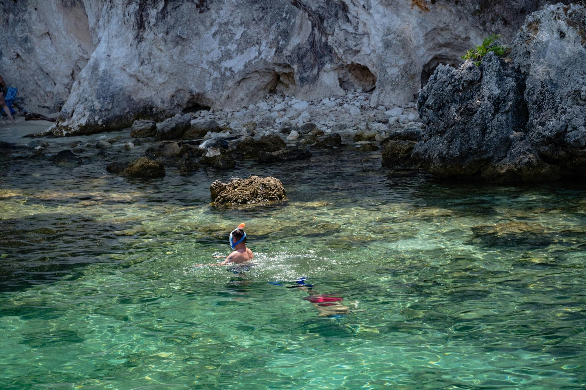 Boat trip from Corfu to Sivota with local lunch, Blue Lagoon and optional transfers