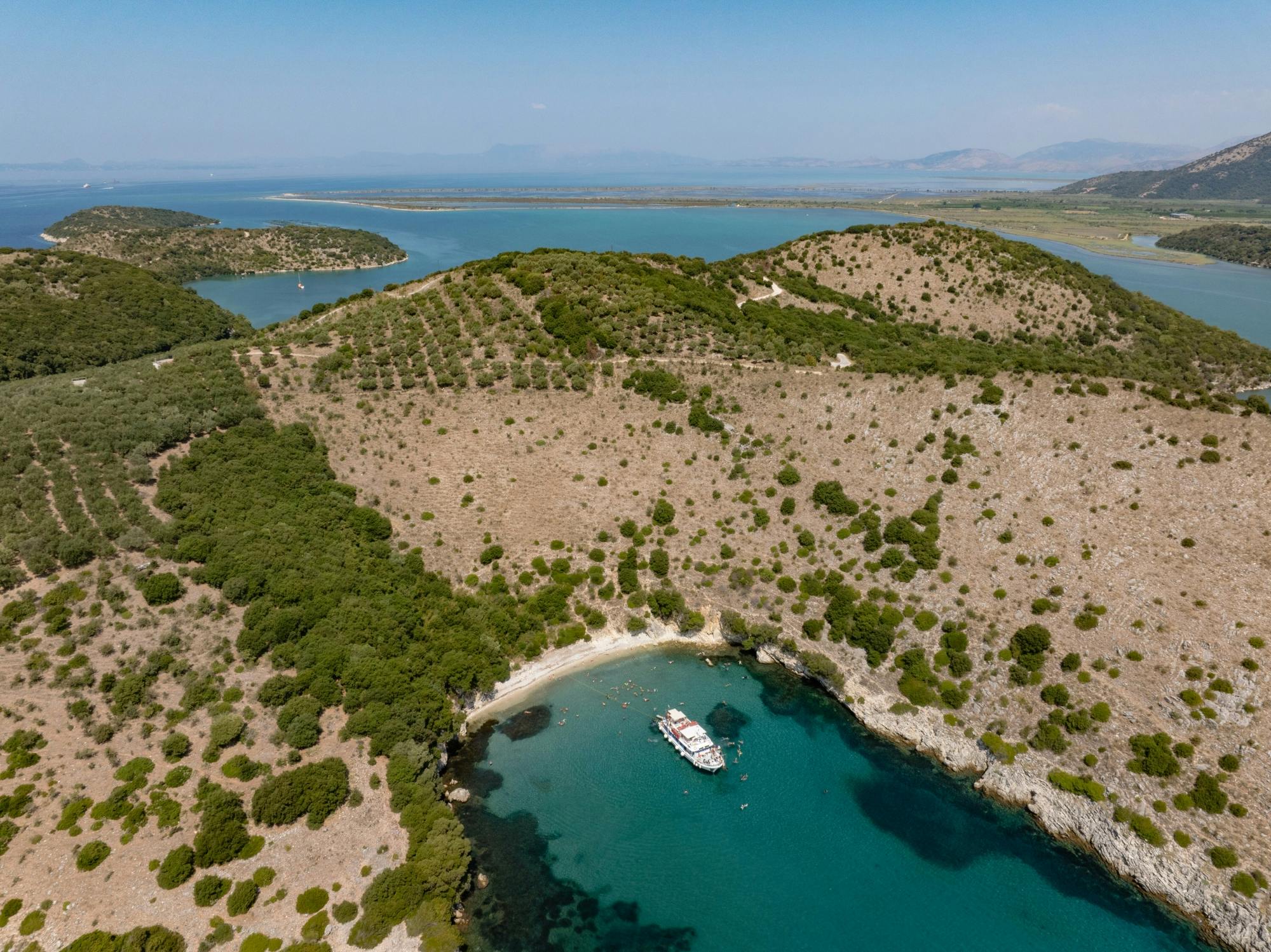 Boat trip from Corfu to Sivota with local lunch, Blue Lagoon and optional transfers