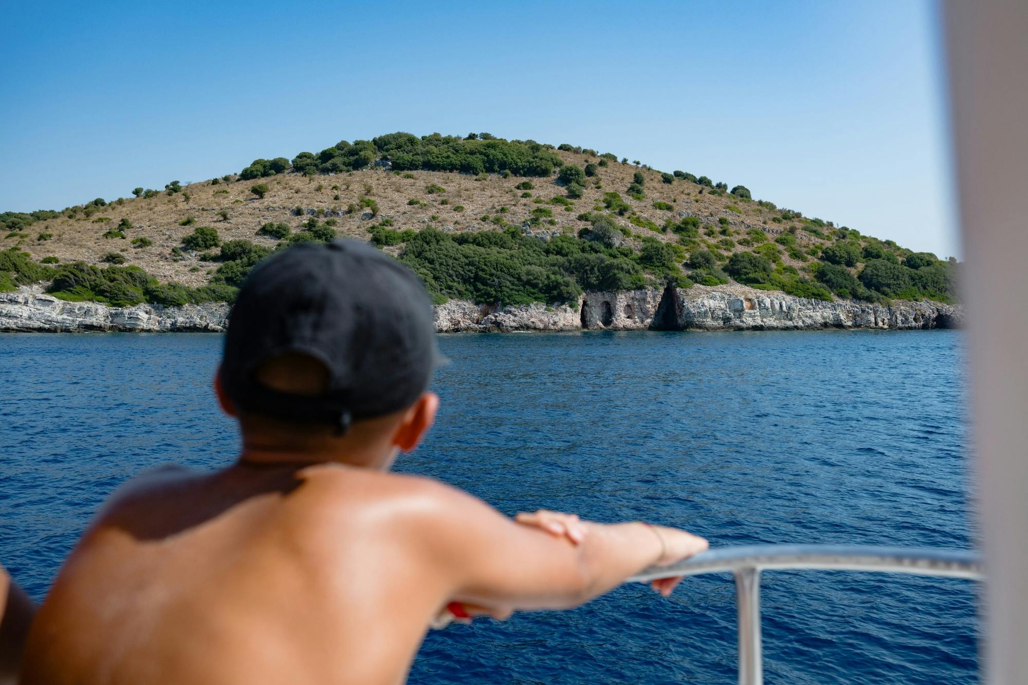 Boat trip from Corfu to Sivota with local lunch, Blue Lagoon and optional transfers