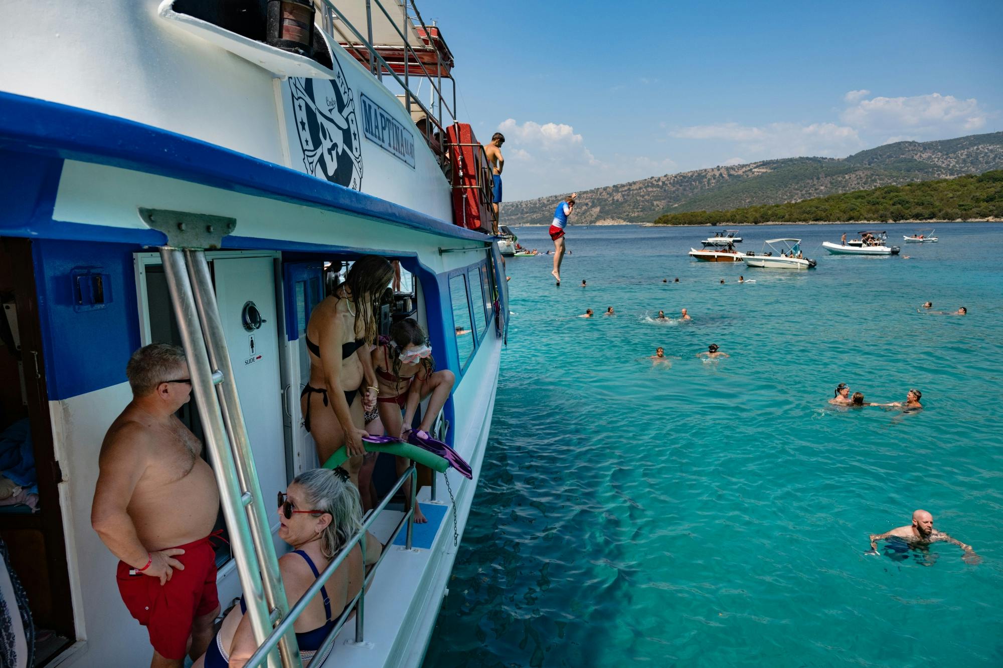 Boat trip from Corfu to Sivota with local lunch, Blue Lagoon and optional transfers