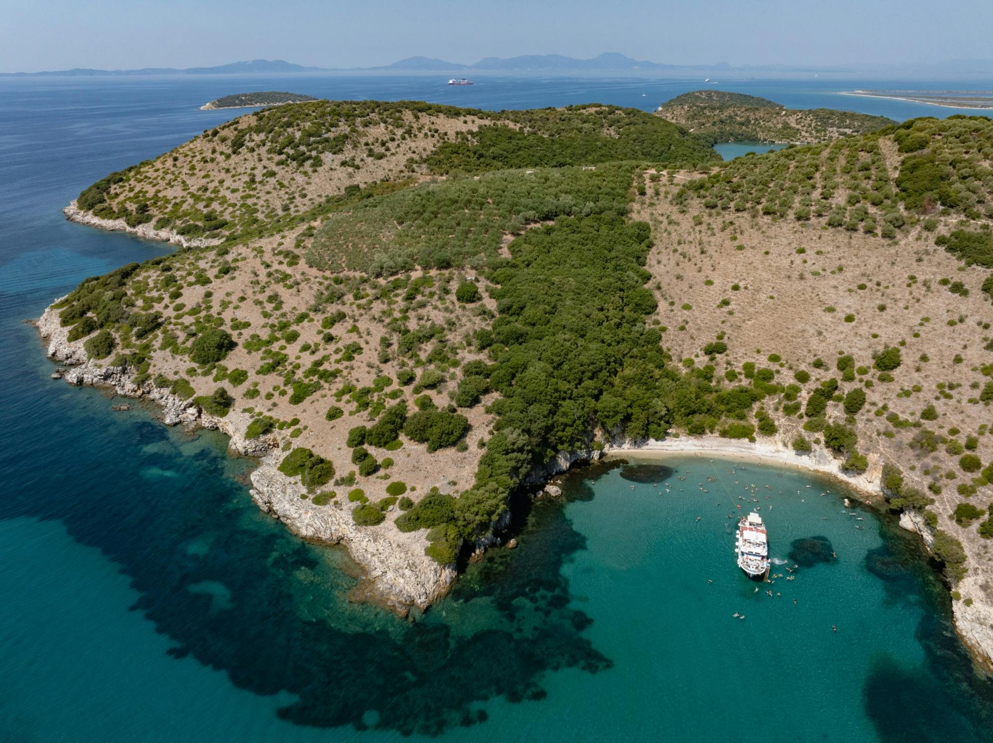 Boat trip from Corfu to Sivota with local lunch, Blue Lagoon and optional transfers