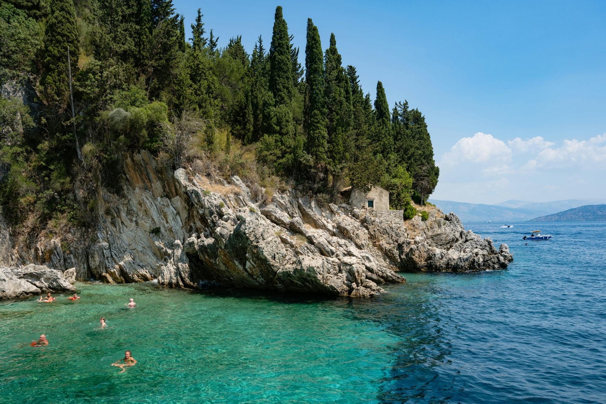Corfu Blue Caves cruise with swim stops, lunch and optional transfers