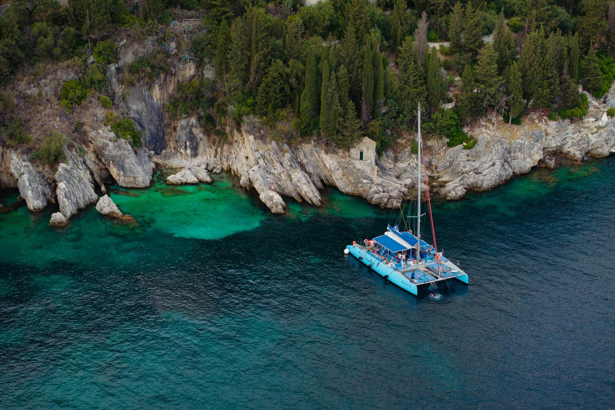 Corfu half-day catamaran cruise with drinks, meal and optional transfers