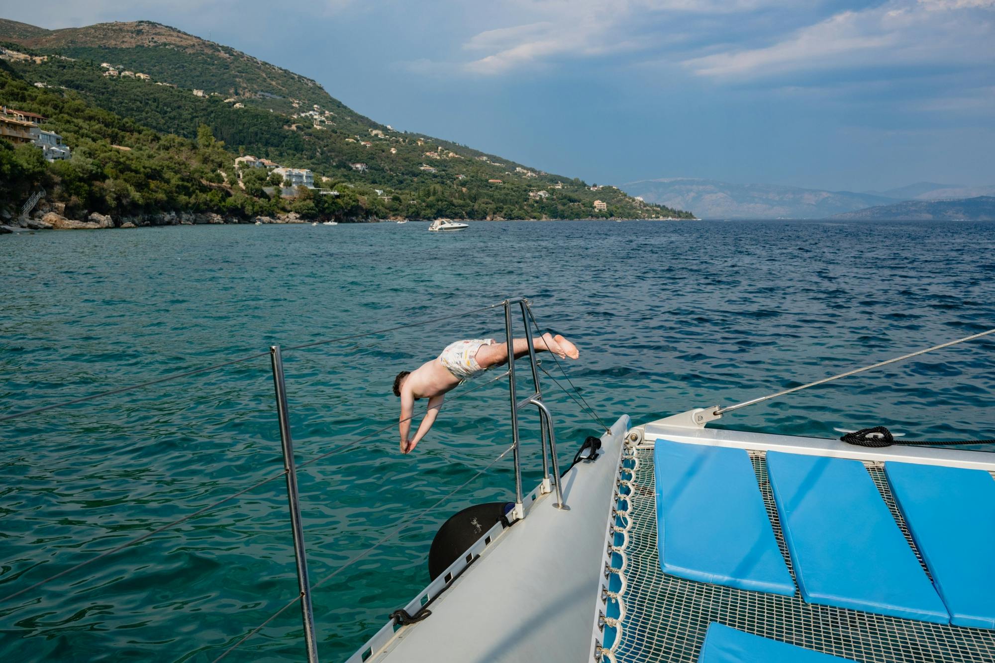Corfu catamaran cruise with Greek lunch, drinks and optional transfers