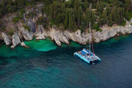 Adults-only Corfu sunset catamaran cruise with drinks, dinner and optional transfers