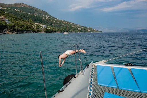 Corfu catamaran cruise with Greek lunch, drinks and optional transfers