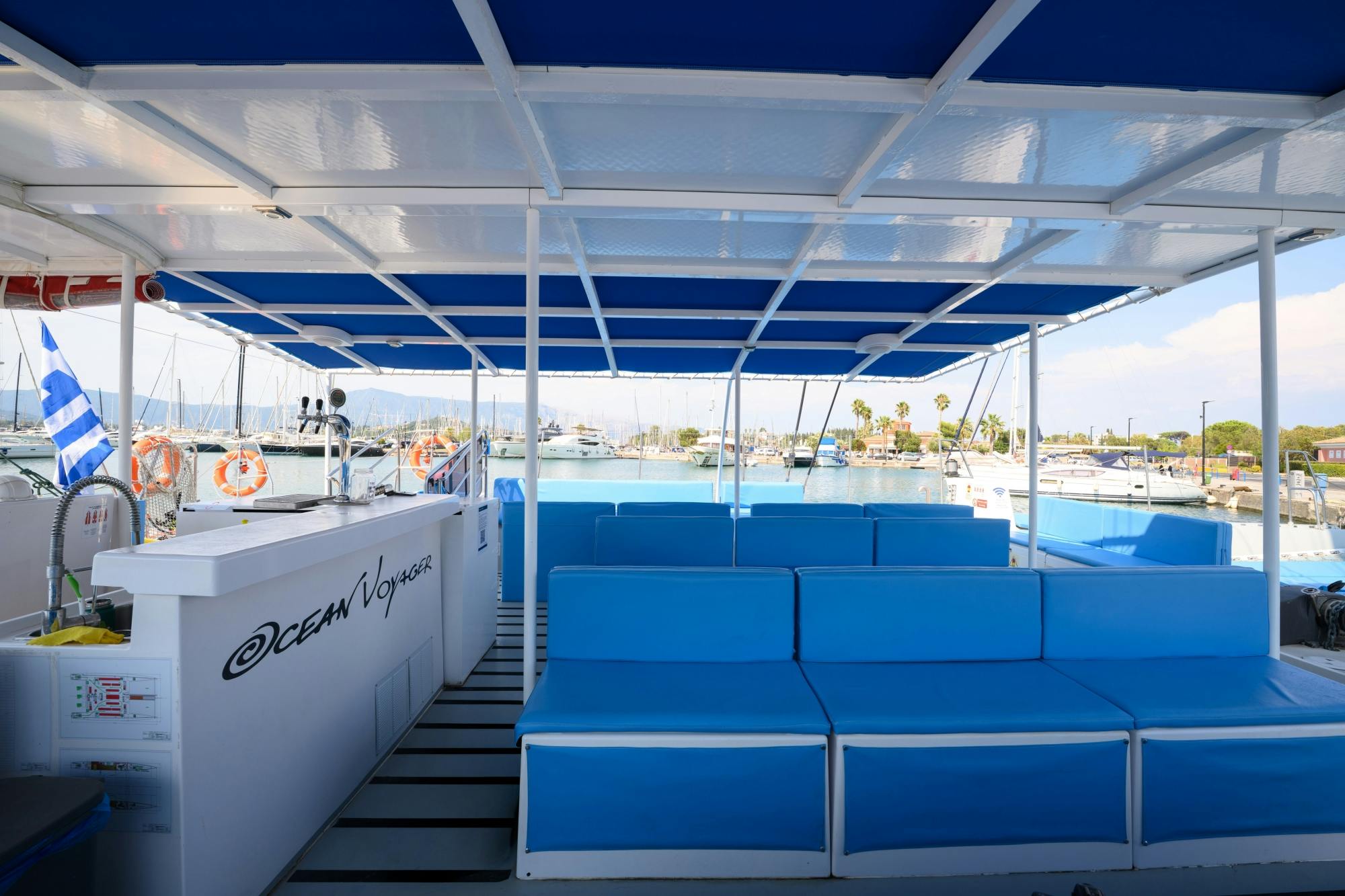 Corfu east coast catamaran cruise with drinks, meal and optional transfers