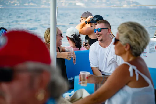 Corfu east coast catamaran cruise with drinks, meal and optional transfers