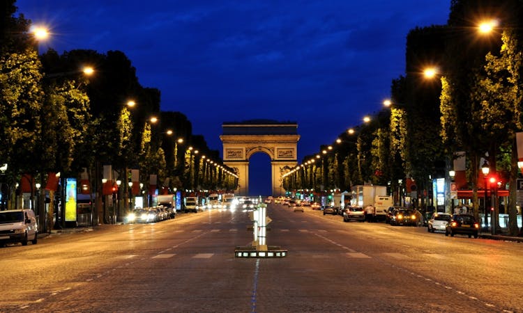 Paris by Night: Illuminations Tour and Moulin Rouge with Champagne