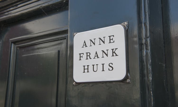 The Anne Frank story before the annex guided walking tour in Amsterdam