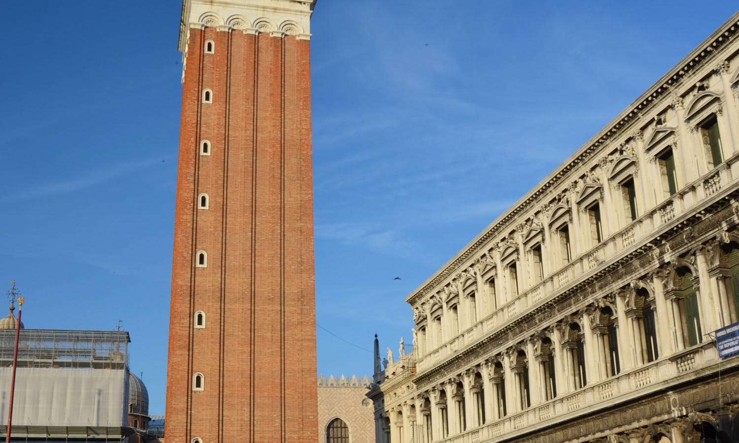 Reflection of Clock tower on Piazza San Marco, Venice_Fotolia_cut.jpg